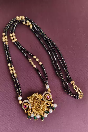 Gold plated temple ganesha black beads necklace