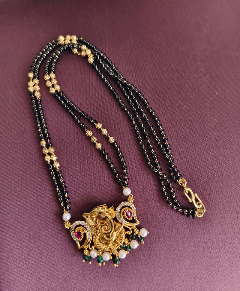 Gold plated temple ganesha black beads necklace