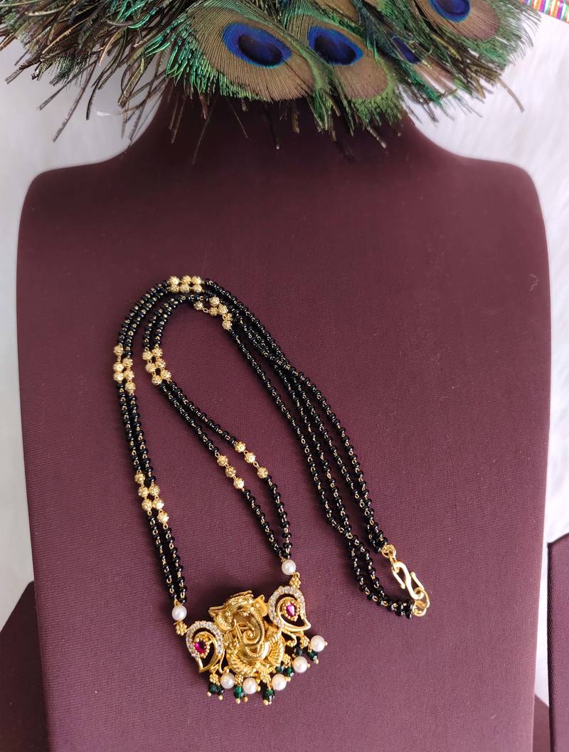 Gold plated temple ganesha black beads necklace