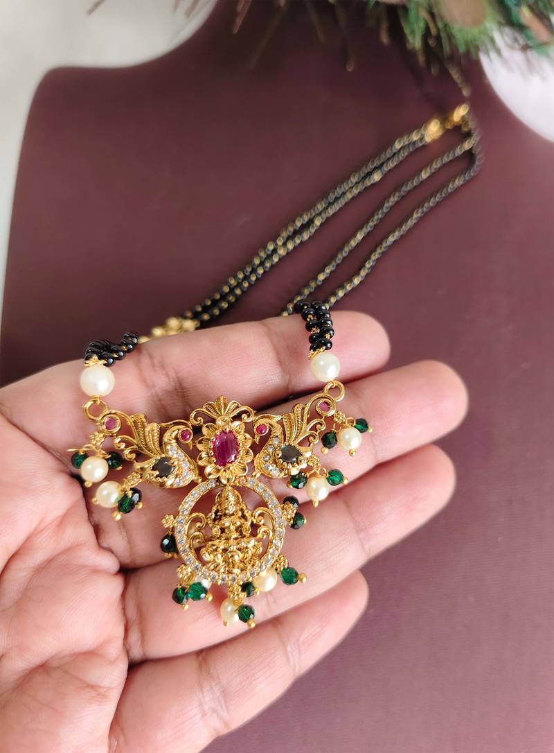 Gold plated temple lakshmi peacock stone black beads necklace