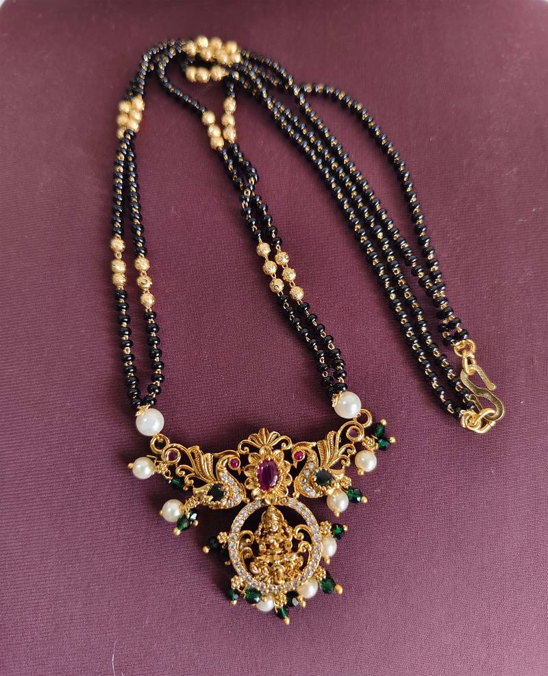 Gold plated temple lakshmi peacock stone black beads necklace