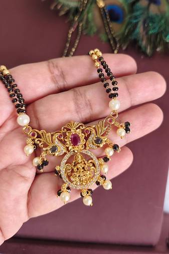 Gold plated temple lakshmi peacock stone black beads necklace