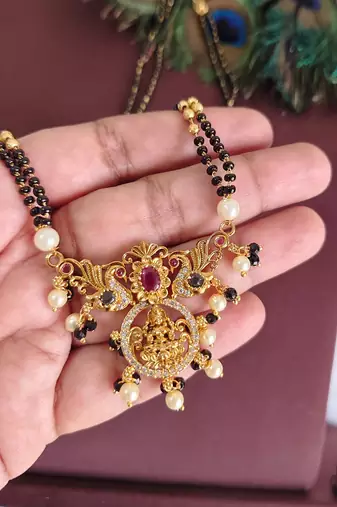 Gold plated temple lakshmi peacock stone black beads necklace