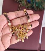 Gold plated temple lakshmi peacock stone black beads necklace