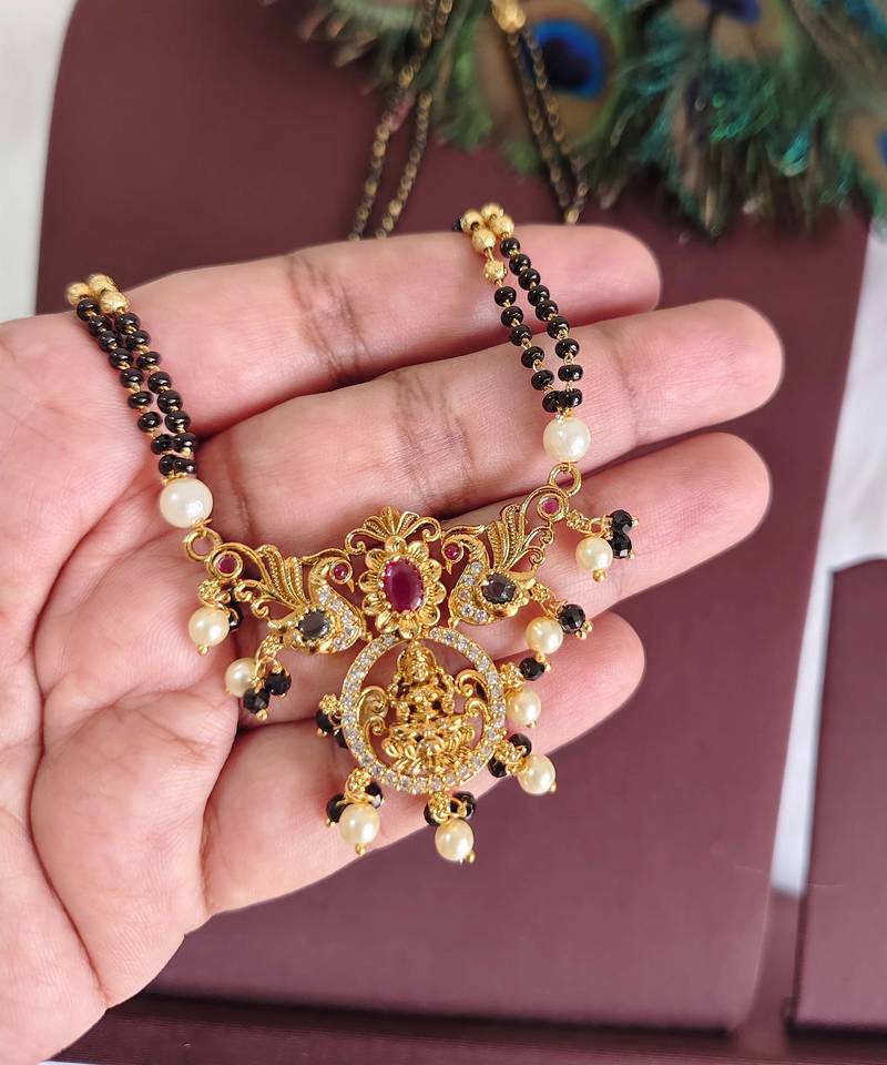 Gold plated temple lakshmi peacock stone black beads necklace
