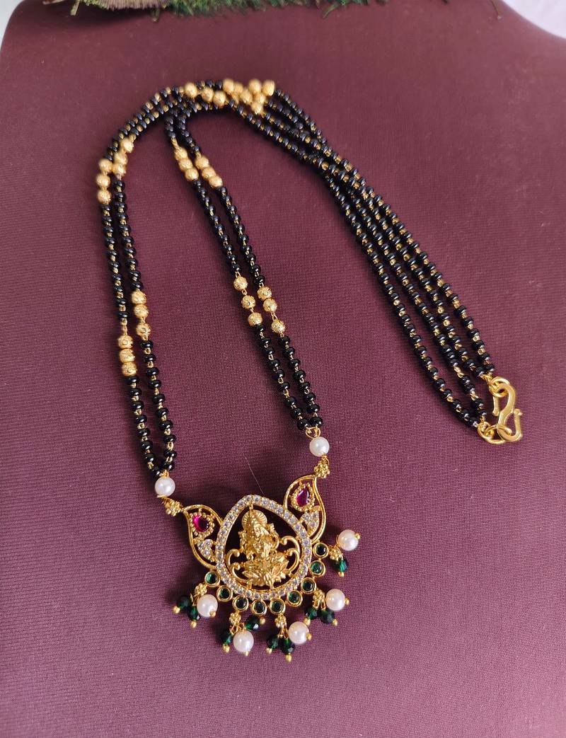 Gold plated temple lakshmi black beads necklace