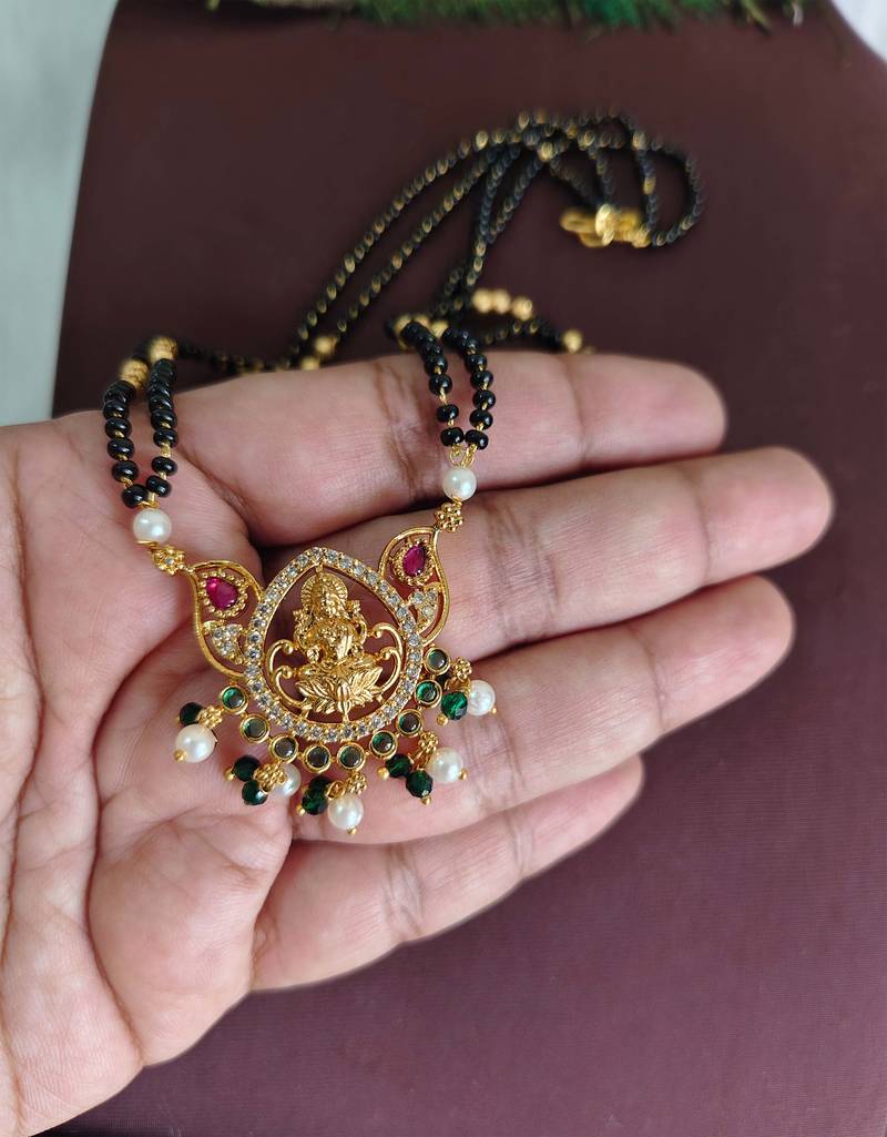 Gold plated temple lakshmi black beads necklace