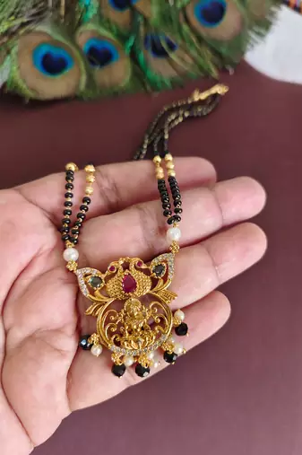 Gold plated peacock temple lakshmi black beads necklace