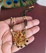Gold plated peacock temple lakshmi black beads necklace
