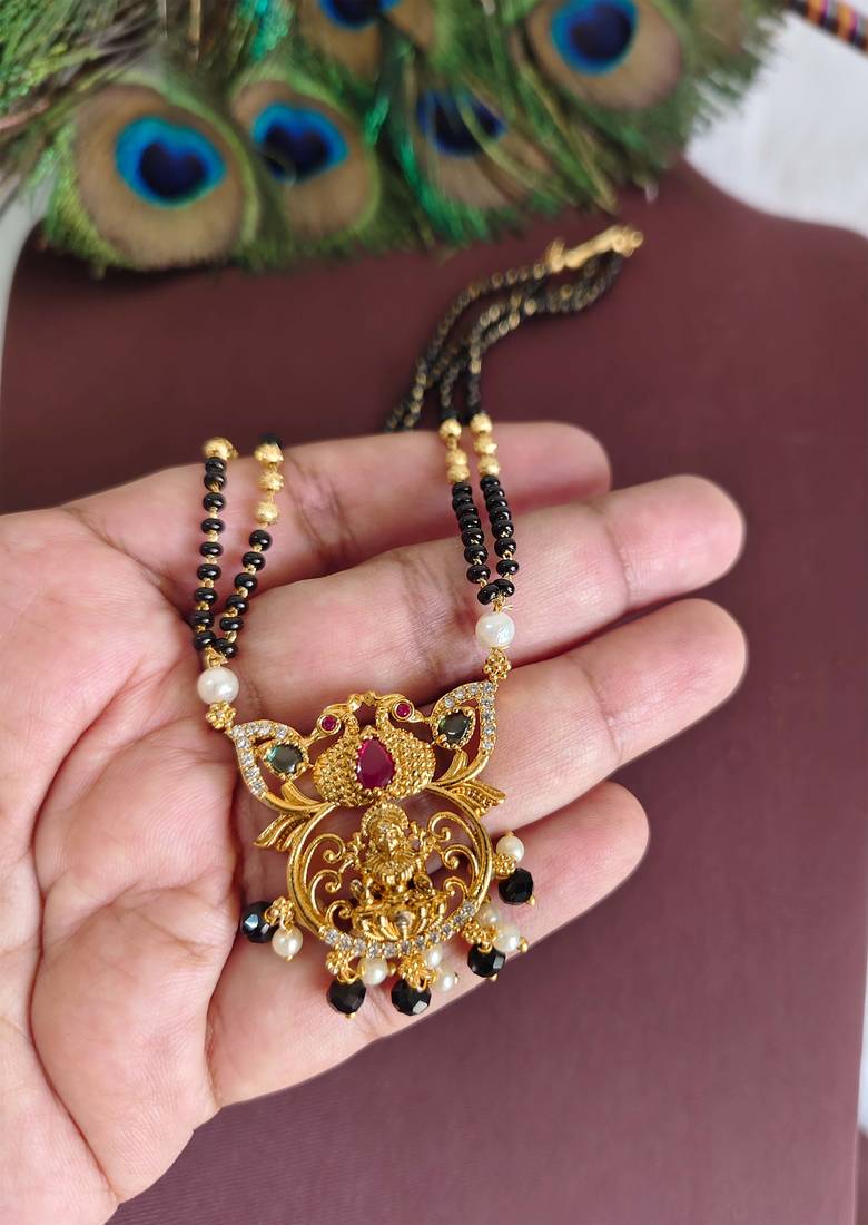 Gold plated peacock temple lakshmi black beads necklace
