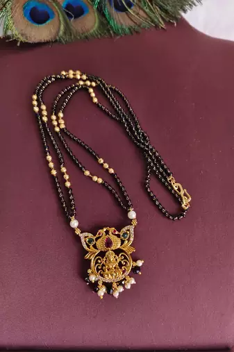 Gold plated peacock temple lakshmi black beads necklace