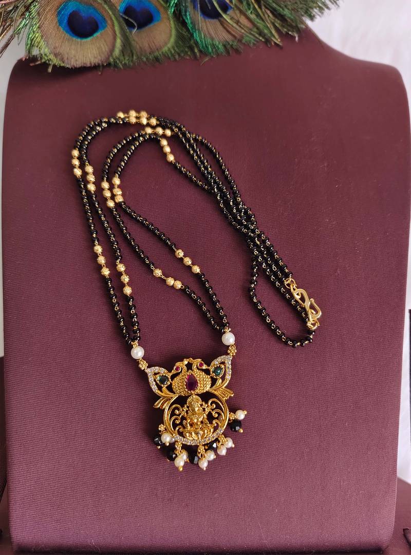 Gold plated peacock temple lakshmi black beads necklace