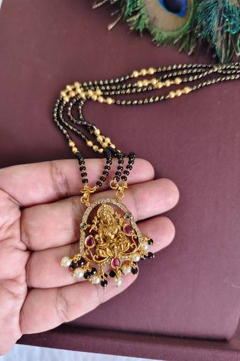 Gold plated temple stone black beads necklace