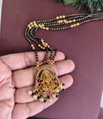 Gold plated temple stone black beads necklace