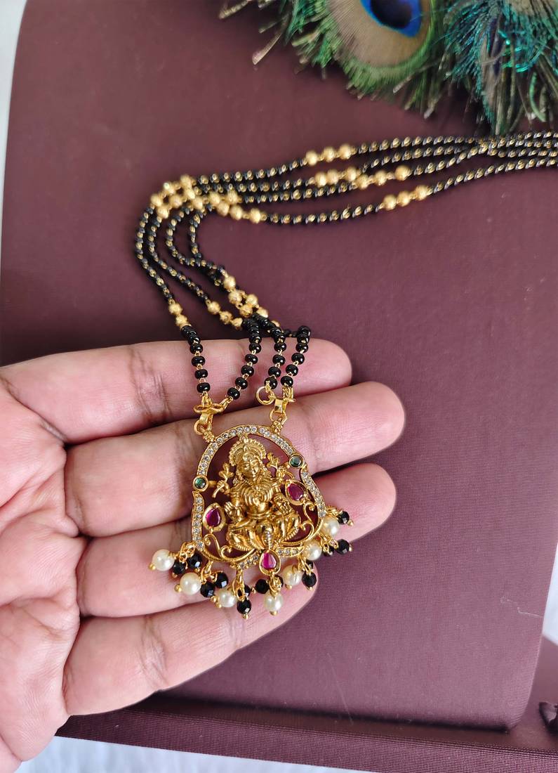 Gold plated temple stone black beads necklace