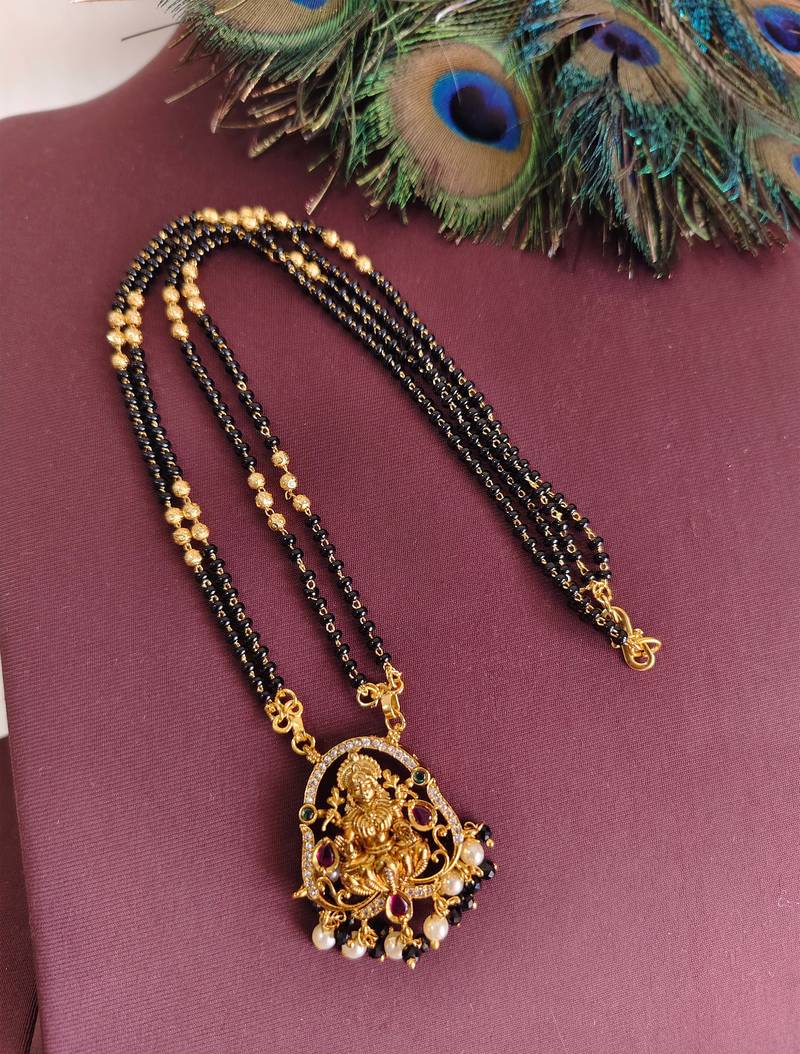 Gold plated temple stone black beads necklace