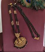 Gold plated temple lakshmi black beads necklace