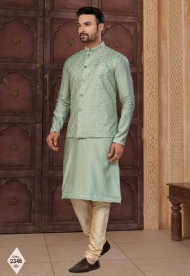 Green silk blend embroidered kurta pajama and nehru jacket 1