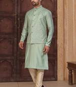 Green silk blend embroidered kurta pajama and nehru jacket
