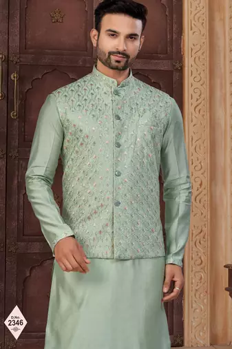Green silk blend embroidered kurta pajama and nehru jacket