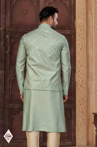 Green silk blend embroidered kurta pajama and nehru jacket
