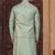 Green silk blend embroidered kurta pajama and nehru jacket