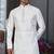 White faux banarasi embroidered kurta pajama and nehru jacket