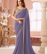 Light indigo georgette saree with heavy embroidered blouse and designer lace border  for weddings, festive