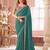 Teal green georgette saree with heavy embroidered blouse and lace border  for weddings, festive & special occasions