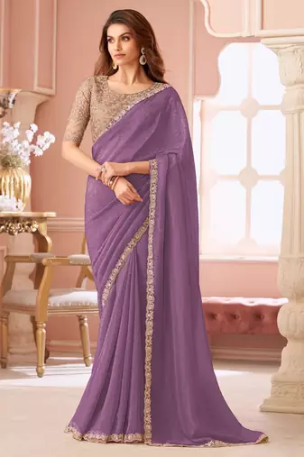Light purple georgette saree with heavy embroidered blouse and designer lace border  for weddings & special occasions