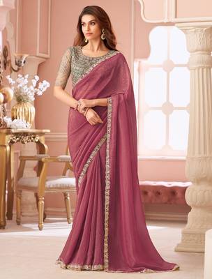 Dark pink georgette saree with heavy embroidered blouse and designer lace border  for weddings & special occasions 1