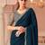 Teal georgette saree with heavy embroidered blouse and designer lace border  for weddings & special occasions