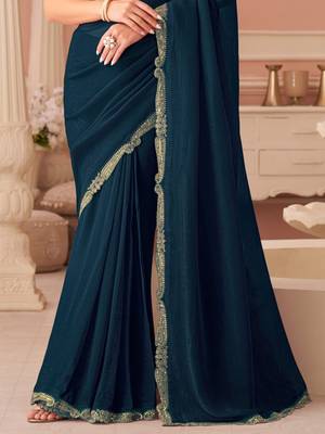 Teal georgette saree with heavy embroidered blouse and designer lace border  for weddings & special occasions 4