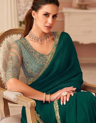 Green georgette saree with heavy embroidered blouse and designer lace border  for weddings, festive celebrations 2