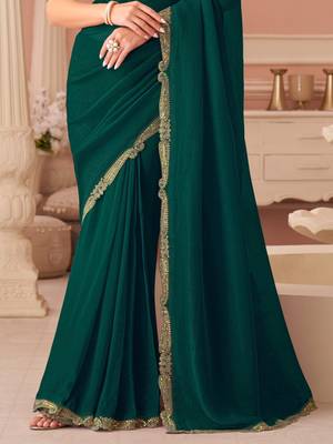Green georgette saree with heavy embroidered blouse and designer lace border  for weddings, festive celebrations 4