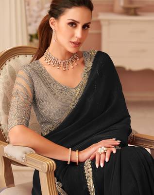 Black georgette saree with heavy embroidered blouse and designer lace border  for weddings, festive celebrations 2