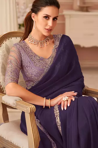 Purple georgette saree with heavy embroidered blouse and designer lace border  for weddings, festive celebrations