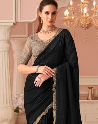 Black georgette saree with heavy embroidered blouse and designer lace border  for weddings, festive celebrations 3