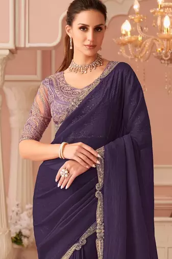 Purple georgette saree with heavy embroidered blouse and designer lace border  for weddings, festive celebrations