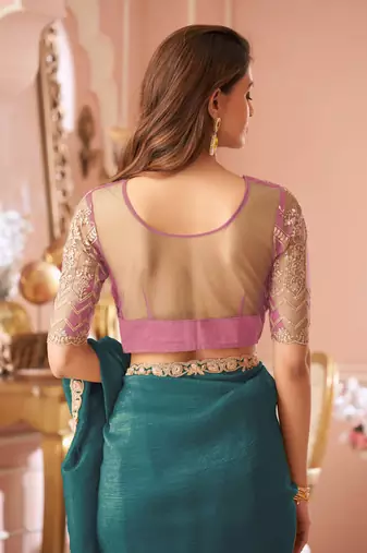 Teal green georgette saree with heavy embroidered blouse and lace border  for weddings, festive & special occasions