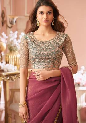 Dark pink georgette saree with heavy embroidered blouse and designer lace border  for weddings & special occasions 3