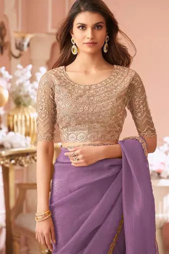 Light purple georgette saree with heavy embroidered blouse and designer lace border  for weddings & special occasions