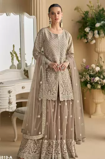 Cream heavy net readymade suit with embroidery & sequence work