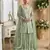 Green heavy net readymade suit with embroidery & sequence work