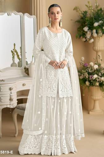 White heavy net readymade suit with embroidery & sequence work