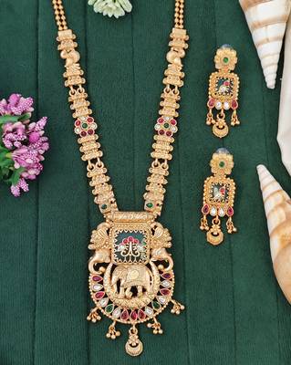 Temple jewelry necklace set featuring elephant design pendant matching earrings for weddings and special occasion 1