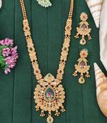 Antique gold-plated temple necklace set with and matching traditional earrings for