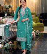 Turquoise heavy chinon reaymade suit with embroidery & sequence work
