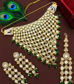 Gold-plated kundan green beads v-shaped necklace set with maang tikka