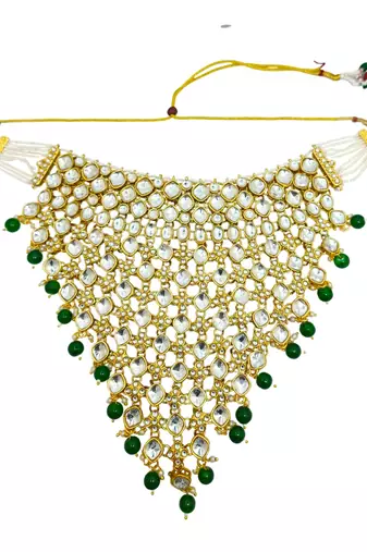 Gold-plated kundan green beads v-shaped necklace set with maang tikka